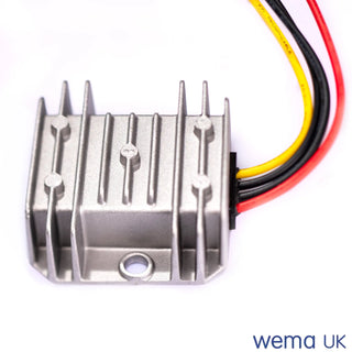 Metal voltage regulator with heat sink fins and colored wires for regulated current