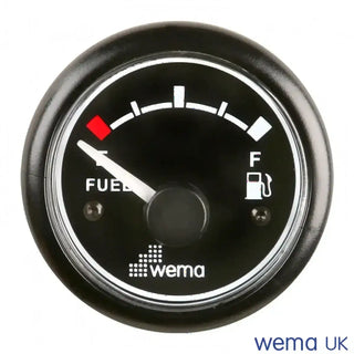 Analogue fuel level gauge with black face and white markings for fuel tank level