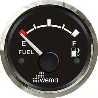 Analogue fuel level gauge with black face and chrome bezel showing empty tank reading