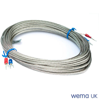 Coiled thermocouple wire with exposed ends and blue connectors for exhaust temperature sender