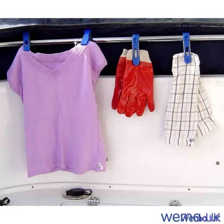 Lavender short-sleeved t-shirt on a rod with a Universal Clip and clothespins